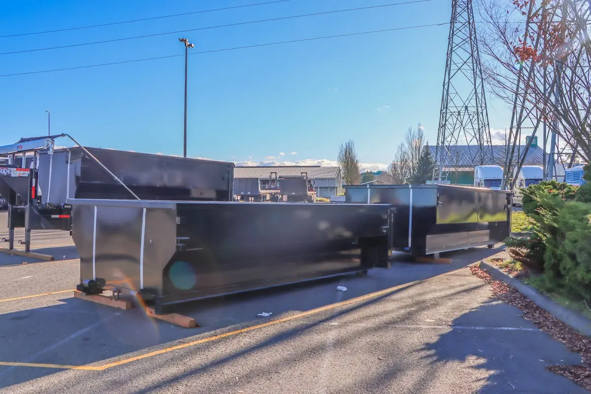 Roll-off dumpster ready for waste disposal at job site for Demolition Dumpster Rental in Lake City